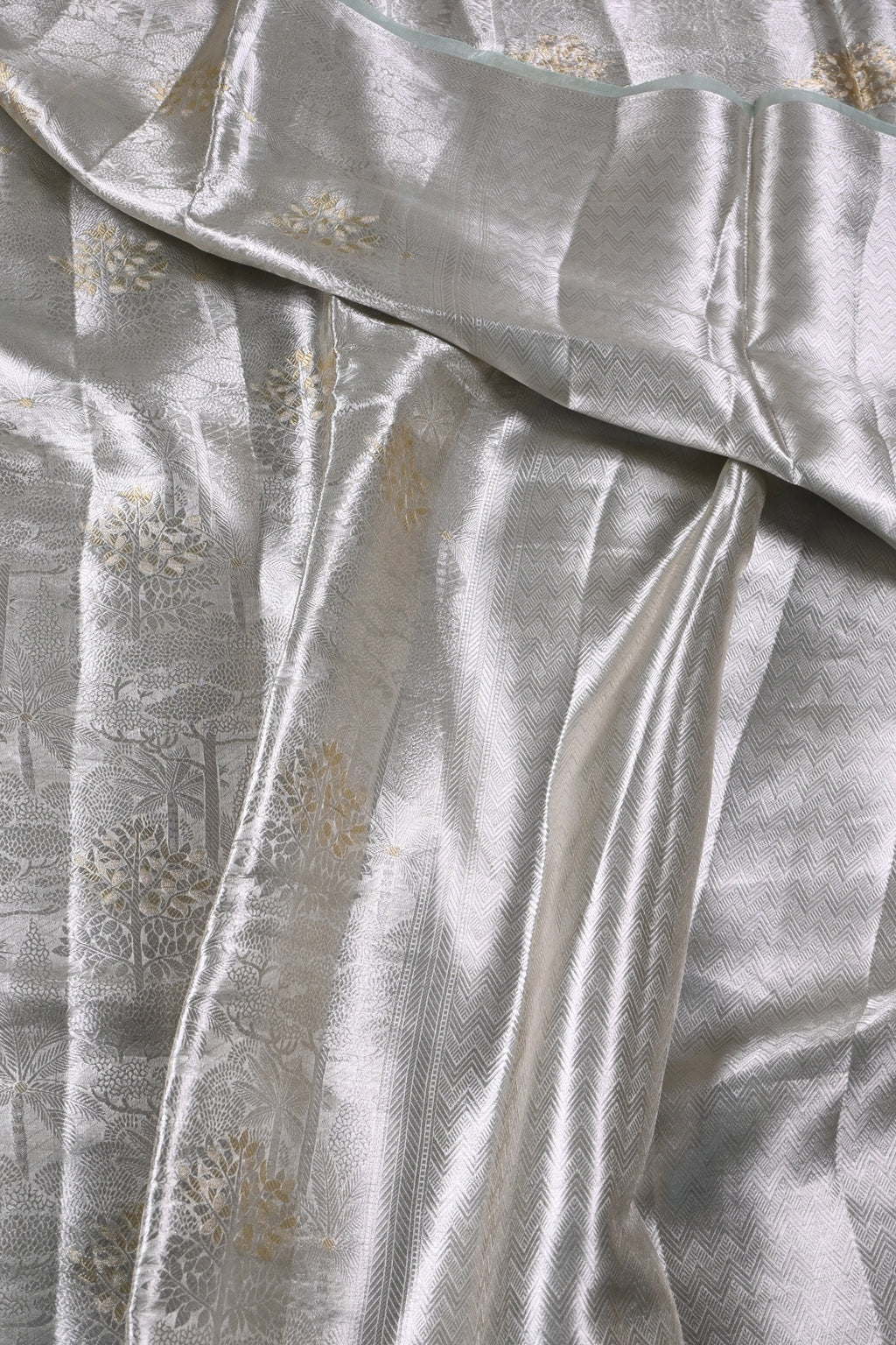 Baby Pista Green Pure Banarasi Molten Tissue Silk Saree